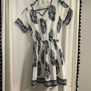 Navy blue design on white dress